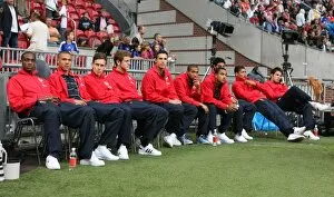 Arsenal players wathc the match between Seville and Inter Milan