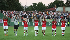 Szombathely V Arsenal 2008-09 Prints: The Arsenal players wave to the fans after the match