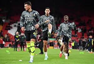 Arsenal Players William Saliba, Ben White, and Bukayo Saka Warm Up Ahead of Liverpool FC Clash (2023-24)