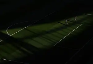 Arsenal V Leicester City 2018-19 Prints: Arsenal: Preparing the Battlefield - The Grounds crew Ready the Pitch for Arsenal vs Leicester City (2018-19)