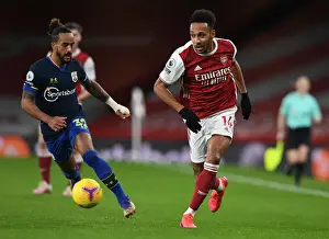 Arsenal V Southampton 2020-21 Prints: Arsenal Rivals Reunited: Aubameyang vs Walcott Battle in Arsenal vs Southampton Clash