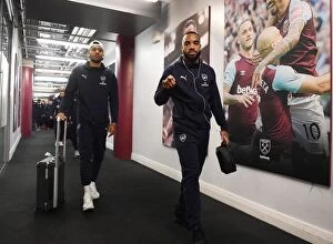 West Ham United v Arsenal 2018-19 Collection: Arsenal Stars Aubameyang and Lacazette Head to Changing Room Before West Ham Showdown (2018-19)