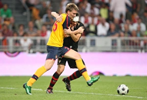 Arsenal V Seville Prints: Arsenal Stars Clash: Bendtner vs. Squillaci at the 2008 Amsterdam Tournament