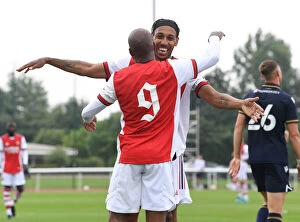 Arsenal v Millwall 2021-22 Collection: Arsenal Stars Lacazette and Aubameyang Celebrate Goal in Pre-Season Victory