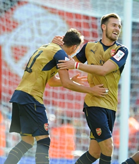 Arsenal V Olympique Lyonnais - Emirates Cup 2015/16 Prints: Arsenal Stars Mesut Ozil and Aaron Ramsey Celebrating Goals against Olympique Lyonnais
