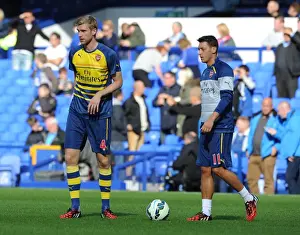 Everton V Arsenal 2014/15 Prints: Arsenal Stars Mesut Ozil and Per Mertesacker Warm Up Ahead of Everton Clash (2014/15)