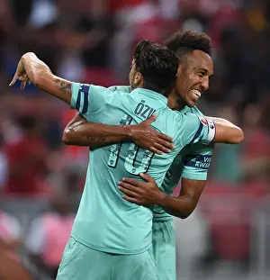 Arsenal V PSG Pre Season Friendly 2018-19 Prints: Arsenal Stars Ozil and Aubameyang Celebrate Goal against Paris Saint-Germain in 2018
