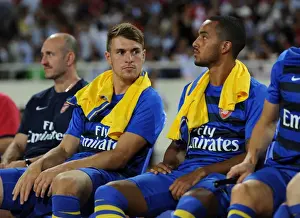 Vietnam V Arsenal 2013-14 Prints: Arsenal Stars Ramsey and Walcott on the Bench during Vietnam Friendly, 2013