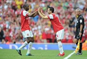 Images Dated 21st August 2010: Arsenal substitute Cesc Fabregas replaces Abou Diaby. Arsenal 6: 0 Blackpool