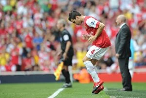 Images Dated 21st August 2010: Arsenal substitute Cesc Fabregas warms up. Arsenal 6: 0 Blackpool, Barclays Premier League