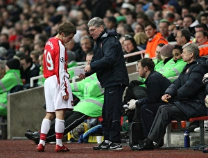 Images Dated 25th November 2008: Arsenal substitute Jack Wilshere talks with assistant
