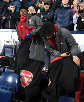 West Bromwich Albion V Arsenal 2017-18 Prints: Arsenal Substitutes Ainsley Maitland-Niles and Mohamed Elneny Before West Bromwich Albion Match