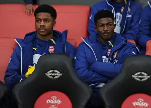 Southampton V Arsenal 2014-15 Prints: Arsenal Substitutes: Akpom and Maitland-Niles Prepare for Southampton Clash (Premier League)