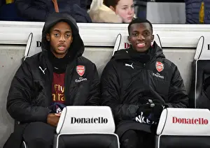 Brighton And Hove Albion V Arsenal 2018-19 Prints: Arsenal Substitutes Joe Willock and Eddie Nketiah Prepare for Brighton & Hove Albion Showdown