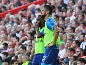 Liverpool V Arsenal 2017-18 Prints: Arsenal Substitutes Lacazette and Giroud at Liverpool's Anfield