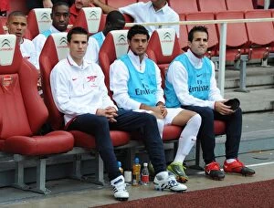 Arsenal v Blackpool 2010-11 Gallery: Arsenal substitutes Robin van Persie, Carlos Vela and Cesc Fabregas. Arsenal 6