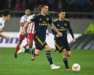 Arsenal Takes on Olympiacos in Europa League: First Leg (2020) - Action Shot at Karaiskakis Stadium, Piraeus, Greece