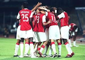 Dinamo Zagreb v Arsenal 2006-7 Collection: The Arsenal team celebrate the 2nd goal, scored by Robin van Persie