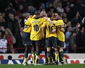 Aston Villa v Arsenal 2006-7 Collection: The Arsenal team celebrate after the match
