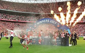Arsenal v Chelsea - FA Cup Final 2017 Collection: The Arsenal team celebrate with the traophy after the match. Arsenal 2: 1 Chelsea