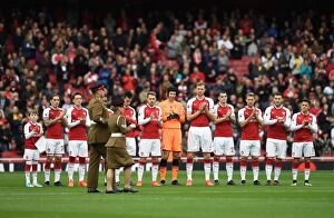 Arsenal v Swansea City 2017-18 Gallery: The Arsenal team clap the soldiers with the rememberance reef before the match. Arsenal 2