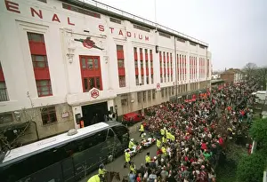 Highbury Stadium Prints: The Arsenal Team coach drops the players at the East Stand on Avenell Road