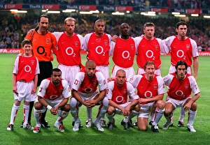 The Arsenal team with mascot Jude Smith before the match