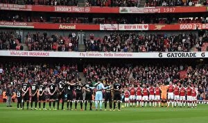 Images Dated 28th October 2017: The Arsenal team have a minutes silence before the match. Arsenal 2: 1 Swansea City