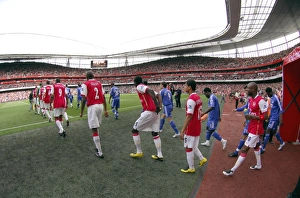Arsenal team walk out of the tunnel before the match