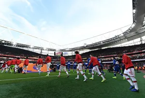Arsenal team walks out before the match
