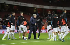Arsenal V Fulham 2011-12 Prints: The Arsenal team warm up before the Barclays Premier League match between Arsenal
