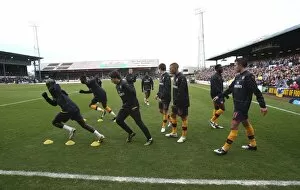The Arsenal team warm up before the match