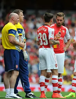 Arsenal V Benfica 2014-15 Prints: Arsenal Training Room: Bellerin and Ramsey Receive Treatment during Arsenal v Benfica Emirates Cup Match