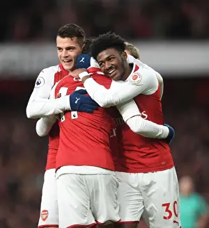 Arsenal V Newcastle United 2017-18 Prints: Arsenal Triumph: Ozil, Xhaka, Maitland-Niles Celebrate Goal vs Newcastle United (2017-18)