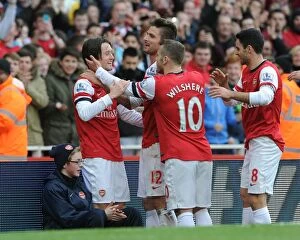 Arsenal v Sunderland 2013-14 Collection: Arsenal Triumph: Rosicky, Giroud, Wilshere, and Arteta Celebrate Goals Against Sunderland (2013-14)