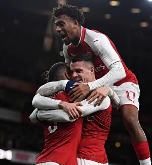 Images Dated 24th January 2018: Arsenal Triumph: Xhaka, Lacazette, and Iwobi Celebrate Goals in Carabao Cup Semi-Final vs. Chelsea