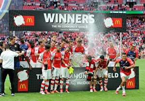 Arsenal V Manchester City - FA Community Shield 2014/15 Prints: Arsenal Triumphs in Community Shield: 3-0 Victory over Manchester City