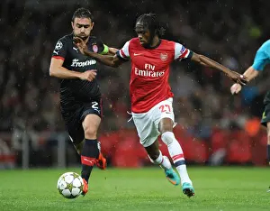 Arsenal V Olympiacos 2012-13 Prints: Arsenal Triumphs Over Olympiacos: Gervinho's Brace Leads 3-1 Victory in Champions League Group B
