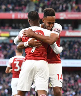 <b class=qtipBold><figcaption>Arsenal v Everton - Premier League</figcaption></b><br>LONDON, ENGLAND - SEPTEMBER 23: (L-R) Alex Lacazette celebrates scoring the 1st Arsenal goal with Pierre-Emerick Aubameyang during the Premier League match between Arsenal FC and Everton FC at Emirates Stadium on September 23, 2018 in London, United Kingdom. (Photo by Stuart MacFarlane/Arsenal FC via Getty Images) *** Local Caption *** Alex Lacazette; Pierre-Emerick Aubameyang<br><em>© 2018 The Arsenal Football Club Plc</em> Arsenal v Everton - Premier League