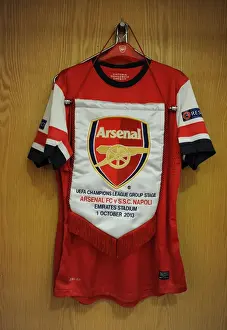 Arsenal V Napoli 2013-14 Prints: Arsenal v Napoli UEFA Champions League: Match Pennant in Arsenal Changing Room (2013-14)