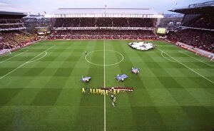 The Arsenal and Villarreal teams shake hands before the match, the last floodlit match at Highbury