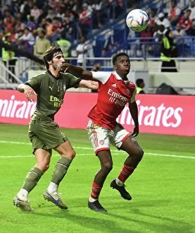 Images Dated 13th December 2022: Arsenal vs AC Milan: Nketiah vs Tonali Clash in Dubai, 2022-23