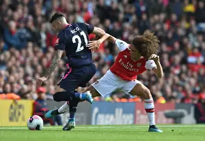 Arsenal V AFC Bournemouth 2019-20 Prints: Arsenal vs. AFC Bournemouth: Matteo Guendouzi Tackles Diego Rico in Premier League Clash