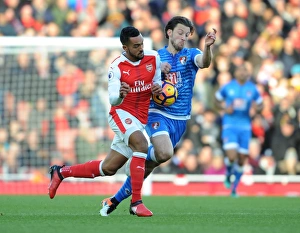 Arsenal V AFC Bournemouth 2016/17 Prints: Arsenal vs. AFC Bournemouth: Theo Walcott vs. Harry Arter Clash in Premier League Showdown