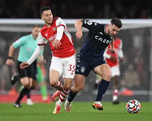 Arsenal V Aston Villa 2021-22 Prints: Arsenal vs Aston Villa: Gabriel Martinelli Clashes with John McGinn in Intense Premier League Showdown