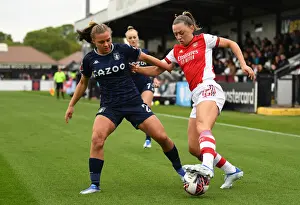 Arsenal vs Aston Villa: Women's Super League Clash - McCabe Fights for Possession