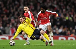 Arsenal v Barcelona 2009-10 Collection: Arsenal vs. Barcelona: Alex Song vs. Lionel Messi - Thrilling Quarter-Final Draw at Emirates Stadium