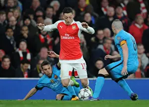 Arsenal V Barcelona 2015/16 Prints: Arsenal vs. Barcelona: Ozil Tripped by Rakitic in Champions League Showdown