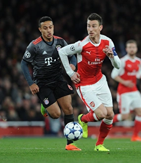 Arsenal V Bayern Munich 2016-17 Prints: Arsenal vs. Bayern Munich: Laurent Koscielny vs