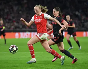 Bayern Munich V Arsenal Women 2022-23 Prints: Arsenal vs. Bayern Munich: A Quarter-Final Battle in the UEFA Women's Champions League at Allianz Arena